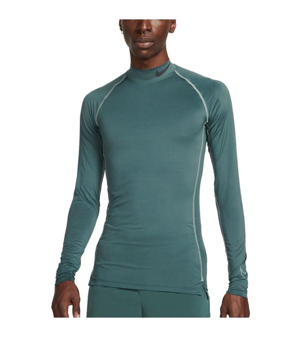 The Nike Pro Dri-FIT Top hugs you in lightweight fabric with breathability built into the areas you normally get hottest to keep you cool and dry from warmups through cool downs. The stretchy, mock-neck design comes in a tight fit that easily layers for warmth. This product is made with at least 75% recycled polyester fibers.
