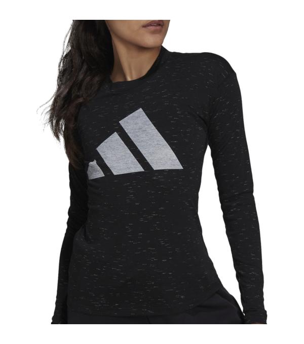 Feel good. Do good. Repeat. This adidas long sleeve tee keeps you comfortable through your daily moves. The heathered fabric is not only super-soft, but it's made with recycled materials.