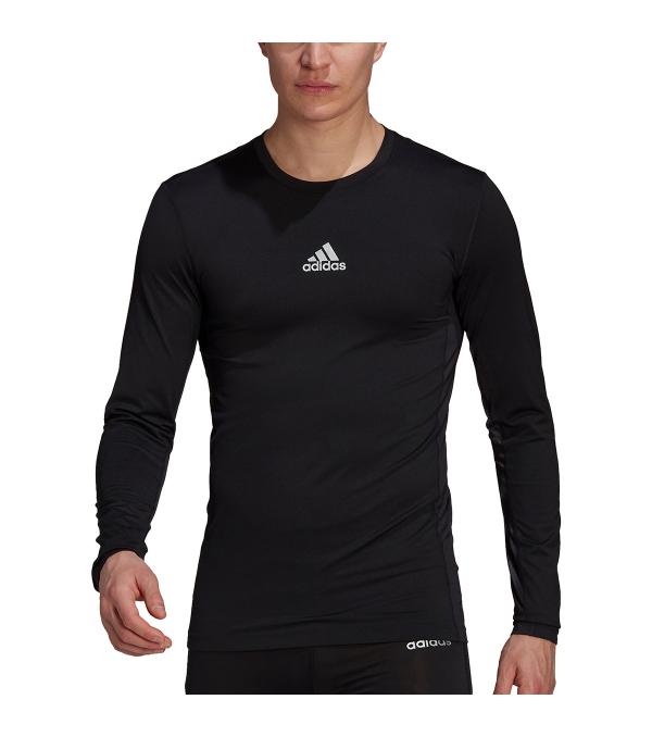 Achieve your goals in this adidas t-shirt. The compression fit supports dynamic movement during training on the pitch. Moisture-wicking fabric with aeroready technology and a mesh back panel keep you feeling fresh until the final whistle. Made from recycled fibres, this model features Primegreen.