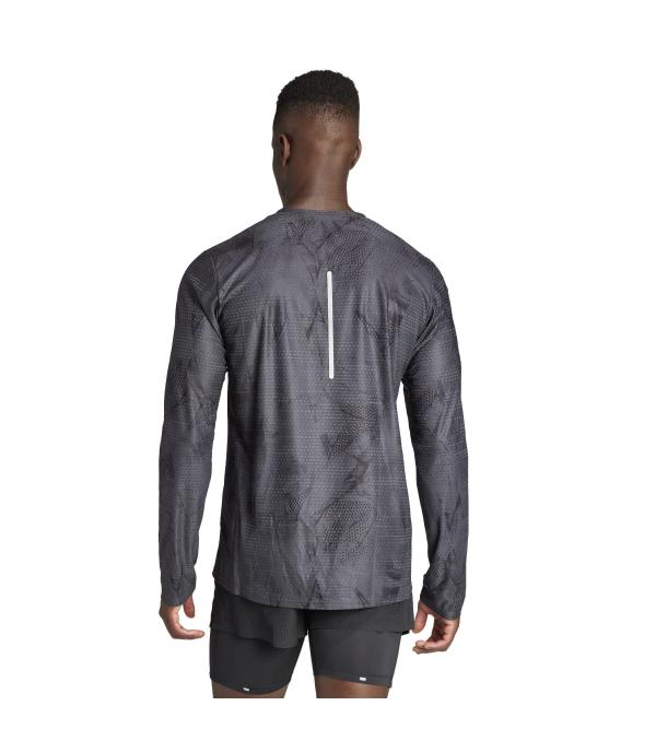 Dominate your run in this long sleeve running tee from adidas. Designed to keep you cool and comfortable on the hottest days, it's made with HEAT.RDY tech that maximises airflow to prevent overheating. Thumbholes and a front key pocket make this versatile long sleeve ideal for layering or wearing alone.