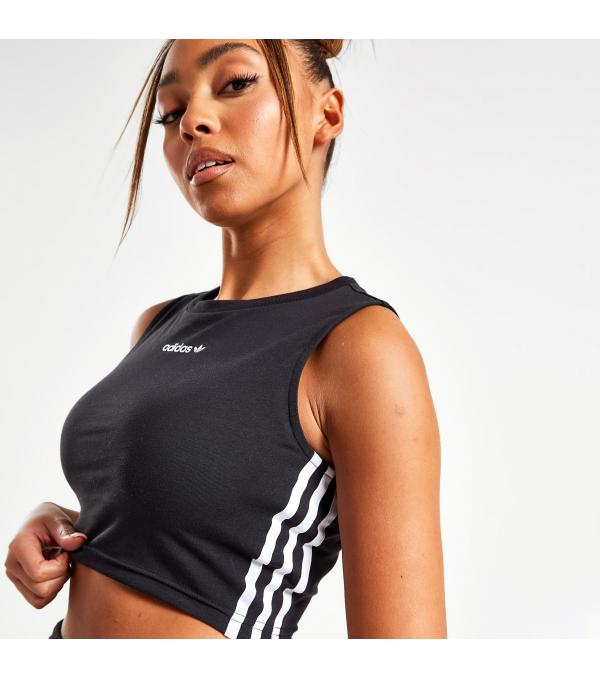 Δώσε sports-inspired αέρα στα street 'fit σου με το tank top adidas Originals Linear 3-Stripes σε ένα μαύρο colorway με signature adi στοιχεία. Σχεδιασμένο σε στενή, cropped γραμμή αυτό το αμάνικο t-shirts έχει πολύ μαλακή και ελαστική αίσθηση, που κολακεύει το σώμα και χαρίζει άνεση σε κάθε σου look. Μην το χάσεις!              Σύνθεση & Φροντίδα Ύφασμα: 92% βαμβάκι/ 8% ελαστάν Φροντίδα: Πλύσιμο στο πλυντήριο              Size & Fit Eφαρμογή: Στενή Design: Cropped Διαστάσεις Μοντέλου: Το μοντέλο έχει ύψος 173 εκ και φοράει μέγεθος Small            Άλλες Πληροφορίες Χρώμα: Μαύρο        