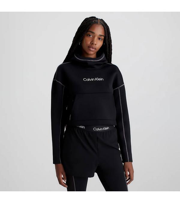 ΓΥΝΑΙΚΕΙΑ CALVIN KLEIN CROPPED ΜΠΛΟΥΖΑ ΜΕ ΚΟΥΚΟΥΛΑ. Ανεση και ευελιξία στις καθημερινές σου δραστηριότητες με τη γυναικεία κοντή μπλούζα με κουκούλα, Calvin Klein Performance Cropped Logo Hoodie Black (00GWF3W325-BAE). • Χαλαρή εφαρμογή • Κουκούλα • Cropped γραμμή • Μπροστινές τσέπες τύπου καγκουρό με φερμουάρ • Λογότυπο CK στο στήθος • 92% polyester, 8% elastane • Κωδικός προϊόντος : 00GMF3J408-BAE