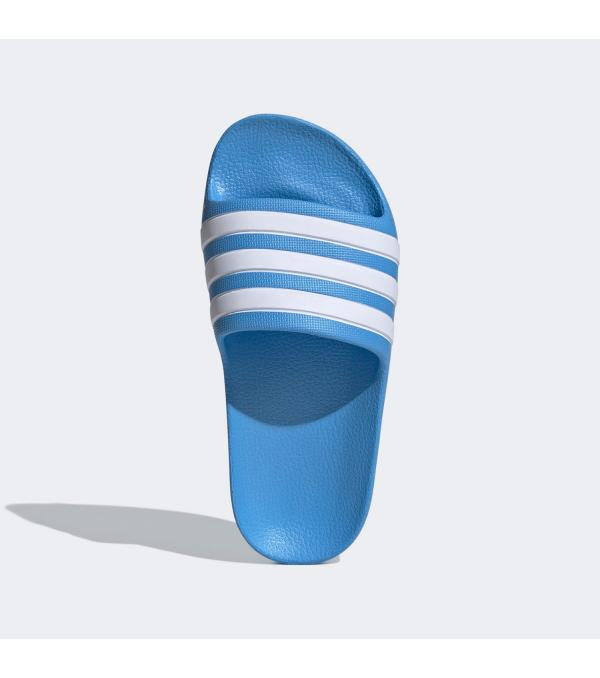 ΜΑΛΑΚΑ SLIDES ΓΙΑ ΤΟ ΝΤΟΥΣ. Τα παιδικά slides adidas adidas Kids Adilette Aqua Slides Blue (ID2621) έχουν το DNA της adidas. Διαθέτουν ενιαίο επάνω μέρος με τις τρεις χαρακτηριστικές ρίγες της adidas, και κάνουν το ντους παιχνιδάκι. Ο μαλακός πάτος τους έχει επένδυση που στεγνώνει γρήγορα για ευκολία και άνεση. • Κανονική εφαρμογή • Slip-on σχεδιασμός • Ενιαίο EVA επάνω μέρος • Μαλακός πάτος Cloudfoam • Ανάλαφρη αίσθηση • Χρώμα προϊόντος: Blue Burst / Cloud White / Blue Burst • Κωδικός προϊόντος: ID2621