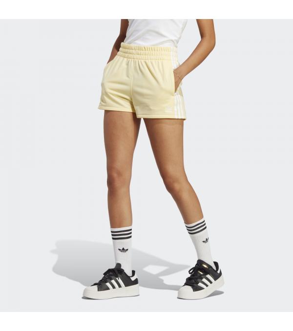 When retro meets comfort meets style for days, you've got one awesome pair of shorts. This pair from adidas checks all the boxes. They're made of tricot that offers softness and a bit of natural stretch. A thick elastic waist makes sure you're comfortable all day, and three pockets — one on each side, one in the back — keep essentials close.Made with 100% recycled materials, this product represents just one of our solutions to help end plastic waste.Πληροφορίες• This model is 176 cm and wears a size S. Their chest measures 81 cm and the waist 58 cm.• Regular fit• Drawcord on elastic waist• 100% recycled polyester tricot• Side pockets• Back pocket• Χρώμα: YellowΦροντίδα• Απαγορεύεται το λευκαντικό• Απαγορεύεται το στεγνό καθάρισμα• Στέγνωμα σε στεγνωτήριο σε χαμηλή θερμοκρασία• Χρησιμοποιήστε μόνο ήπιο απορρυπαντικό• Πλύντε τα σκούρα χρώματα ξεχωριστά• Πλύντε και σιδερώστε από την ανάποδη• Σιδέρωμα σε χαμηλή θερμοκρασία• Χλιαρό πλύσιμο στο πλυντήριο σε πρόγραμμα για ευαίσθητα 